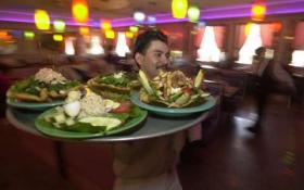 A waiter at a Bronx restaurant. . (KEITH D. BEDFORD/NEW YORK DAILY NEWS)